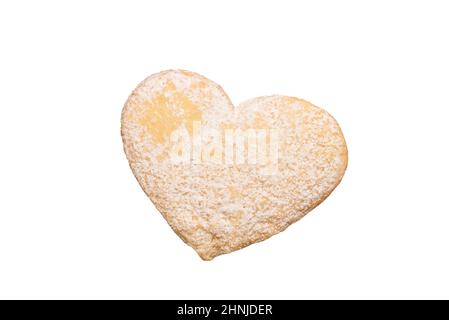 Shortbread in the shape of a heart isolated on a white background. Stock Photo
