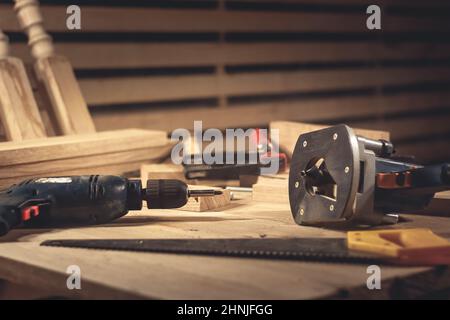 Different construction tools with Hand tools for home renovation on wooden board maintenance and reparing concept. Stock Photo