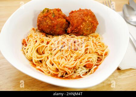 Angel Hair Pasta with Two Meatball and Tomato Sauce Stock Photo