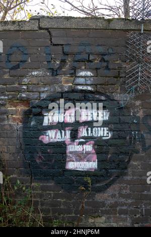 Glasgow, Scotland. UK. 27th November 2021: Pro-vax artwork outside Parkhead. Stock Photo