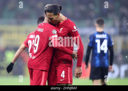 Milan, Italy, February 16, 2022, Roberto Firmino of Liverpool Fc celebrates after scoring his team's first goal with team mate Virgil van Dijk during the UEFA Champions League Round Of Sixteen Leg One match between Fc Internazionale and Liverpool Fc at Stadio Giuseppe Meazza on Februart 16, 2022 in Milan, Italy . Stock Photo