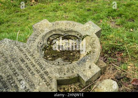 Fallen Victorian gravestone at Blackburn Old Cemetery. Whalley New Road, Blackburn. Stock Photo