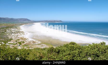 Beautiful white sand Noordhoek beach along Chapman's peak drive Cape Town South Africa. Noordhoek Beach Cape Town Stock Photo