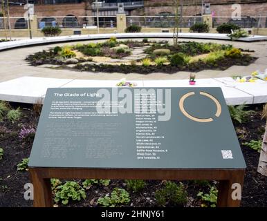 Manchester, UK, 17th February, 2022.  The Glade of Light memorial: a white marble ‘halo’ bearing the names of those killed in the 22nd May 2017 bombing. The Manchester Arena Inquiry has heard that MI5 had intelligence to assess Salman Abedi as a threat to national security and open an investigation before he carried out the bombing on 22nd May 2017, killing 22 people and injuring hundreds. Credit: Terry Waller/Alamy Live News Stock Photo