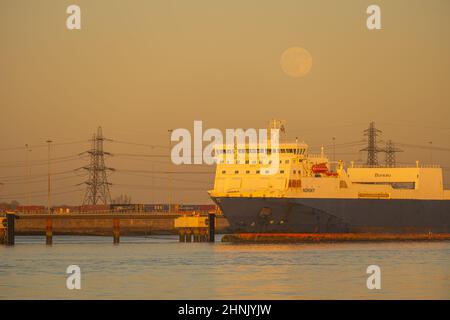 Norsky Ro-Ro ferry moored at Tilbury 2 from Gravesend Kent with a full moon rising behind Stock Photo