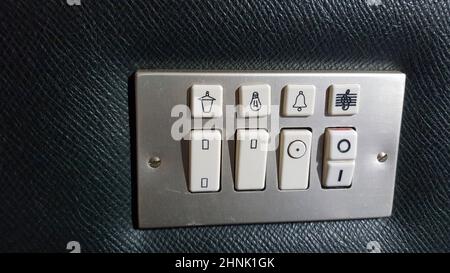 Seventies style switch panel for hotel. Closeup Stock Photo
