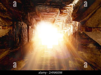 Amazing of golden light through hole. sun shining through the with beautiful rays and lens flare Stock Photo