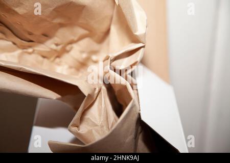 Brown Paper in a Box Stock Photo