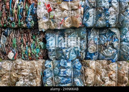 Plastic bottles in bales for waste recycling Stock Photo