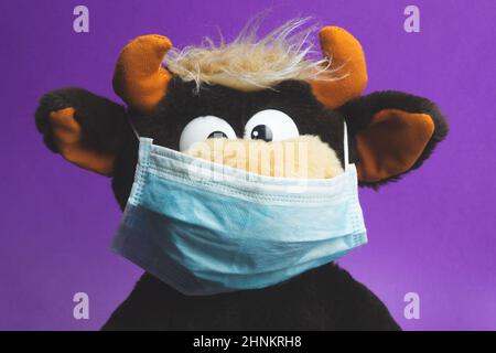 Funny plush toy in a protective mask Stock Photo