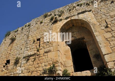 The main entrance to the ruins of crusader Fortress Chateau Neuf - Metsudat Hunin is located at the entrance to the Israeli Margaliot village in the Upper Galilee in northern Israel Stock Photo