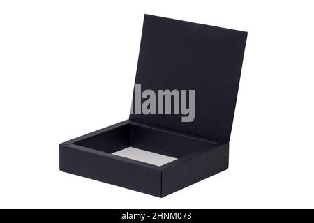 Open black cardboard box or box with magnetic closure isolated on white background. Macro photograph. Stock Photo