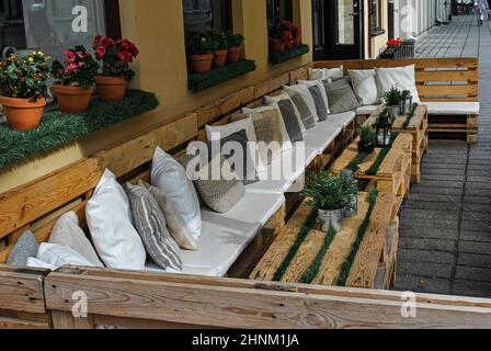 Summer Terrace Cafe with pillows and wooden pallets Stock Photo