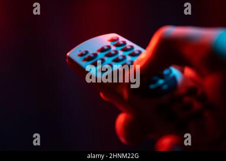 Hold remote control in hand 2 Stock Photo