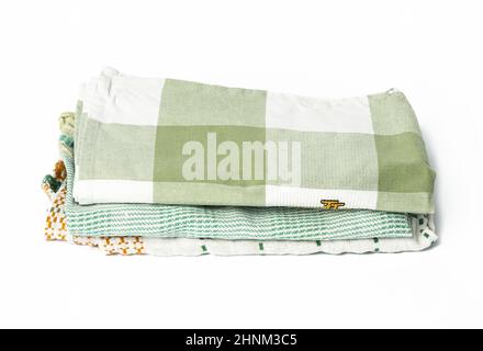 folded green linen towel on white background, top view Stock Photo