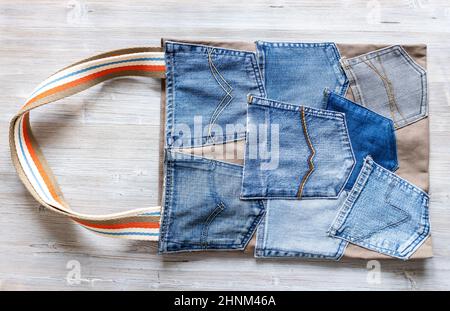 Shopping Bag handcrafted from used denim pockets Stock Photo