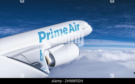 Amazon Prime Air commercial transport cargo Aeroplane flying in the sky above the mountains Stock Photo