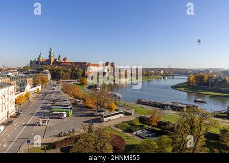 Wawel Royal Castle, aerial view on an autumn sunny day, sightseeing balloon over Vistula river, Krakow, Poland Stock Photo