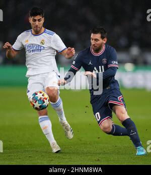 Derby, UK. 15th Feb, 2022. Lionel Messi of PSG & Marco Asensio of Real Madrid during the UEFA Champions League round of 16 1st leg match between Paris Saint-Germain Feminines and Real Madrid at Le Parc des Princes, Paris, France on 15 February 2022. Photo by Andy Rowland. Credit: PRiME Media Images/Alamy Live News Stock Photo
