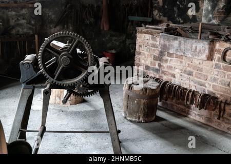 Historic hoof and wagon forge Stock Photo - Alamy