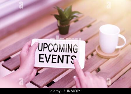 Text sign showing Upcoming Events, Concept meaning a planned public or social occasion happening soon Voice And Video Calling Capabilities Connecting Stock Photo