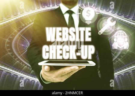 Text caption presenting Website Check Up, Word for an examination of a website to see if something is in order Man In Office Uniform Holding Tablet Di Stock Photo