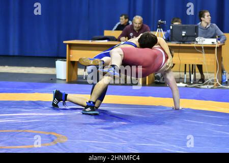 Orenburg, Russia - October 25-26, 2017: Boys compete in sports wrestling Stock Photo