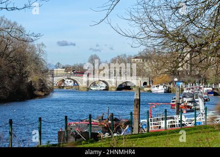 Richmond bridge and the River Thames riverside on a sunny winters day, Richmond  Greater London England UK Stock Photo