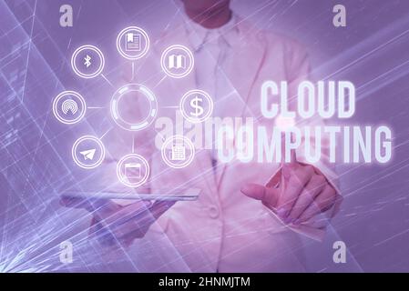 Text caption presenting Cloud Computing, Word Written on use a network of remote servers hosted on the Internet Lady In Uniform Holding Tablet In Hand Stock Photo