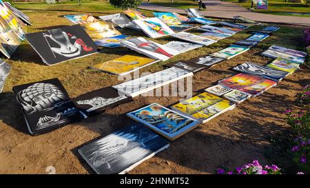 Egypt, Sharm El Sheikh - June 20, 2019: paintings for sale on the street in a park in the Amway Hotel. Flea market and street gallery of art and creativity. Stock Photo
