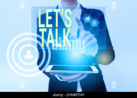 Hand writing sign Let S Talk, Business approach they are suggesting beginning conversation on specific topic Woman In Uniform Holding Mobile Phone Sho Stock Photo