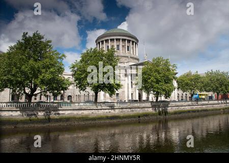 The river Liffey in Dublin with the Four Courts Building Stock Photo