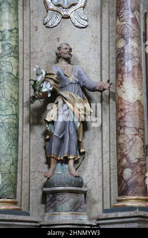 Saint Joseph, statue on the altar of the Immaculate Conception in the Franciscan Church of St. Peter in Cernik, Croatia Stock Photo