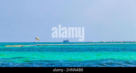 Boats yachts between Cozumel island and Playa del Carmen Mexico. Stock Photo