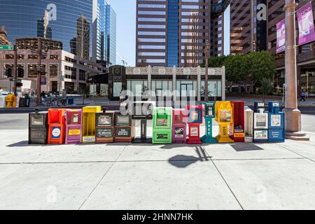 newspaper boxes with free newspaper for everyone. These papers  are financed by advertising. Stock Photo