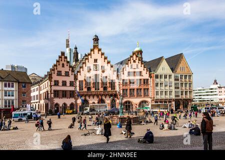 people visit the roemer, the central square in Frankfurt with town hall view Stock Photo