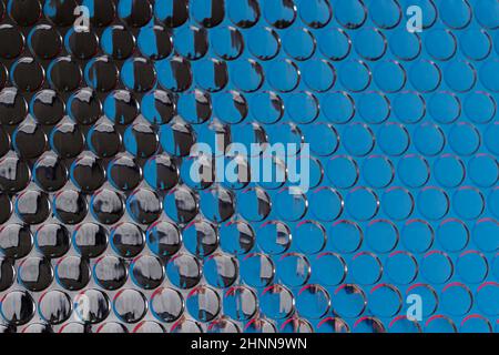 Abstract modern futuristic trendy silver circles pattern background with blue and red reflections Stock Photo