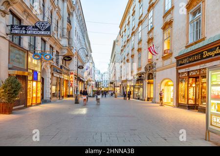 People visit Graben in Vienna by night. Graben street is among most recognized streets in Vienna which is the capital city of Austria Stock Photo