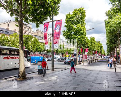 people walking and visiting the famous street in Paris, the Champs d´elysees in the heart of Paris Stock Photo