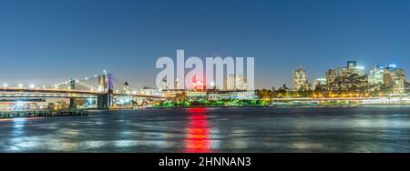 skyline of Brooklyn with Brooklyn and Manhattan bridge  by night Stock Photo