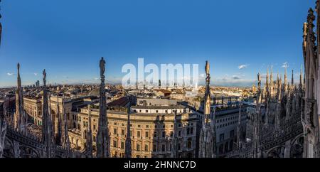 view from famous Milan Cathedral - Duomo (Dome of Milan) to the main square in Milan, Piazza del Duomo. Stock Photo