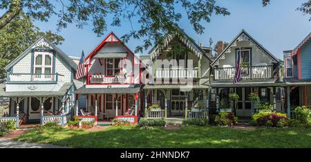 Carpenter Gothic Cottages with Victorian style, gingerbread trim in Wesleyan Grove, town of Oak Bluffs on Martha's Vineyard, Massachusetts Stock Photo