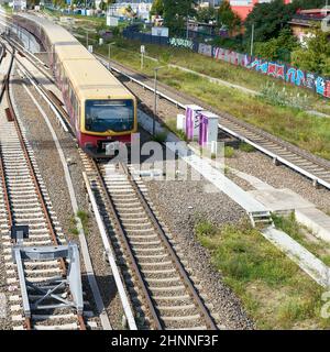 moving S-Bahn in the direction of Ostbahnhof station in downtown Berlin Stock Photo