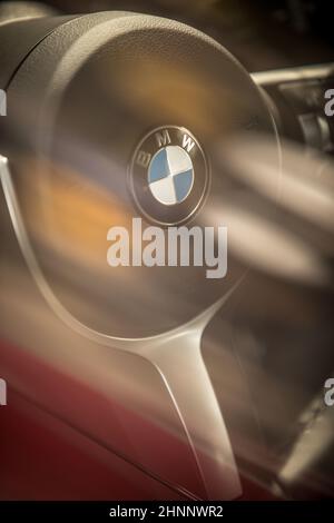 BMW logo on a steering wheel Stock Photo