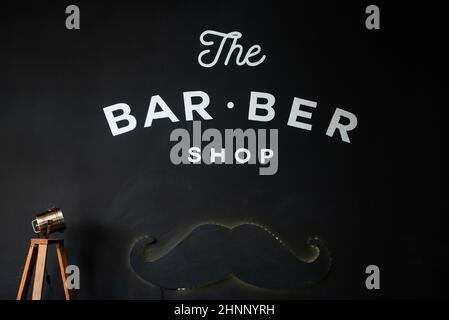 the tools of a Barber on the desktop in front of the mirror Stock Photo