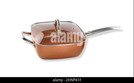 copper deep frying pan with transparent lid on white background Stock Photo