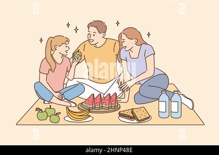 Having picnic and leisure time with family concept. Smiling happy family father mother daughter sitting together eating fruits having picnic vector il Stock Photo