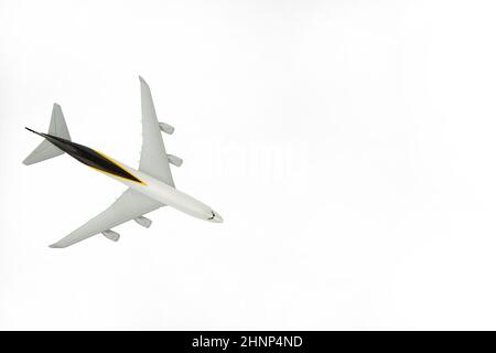 Flying commercial passenger jet plane Take off airplane. Isolated on white background and copy space Stock Photo