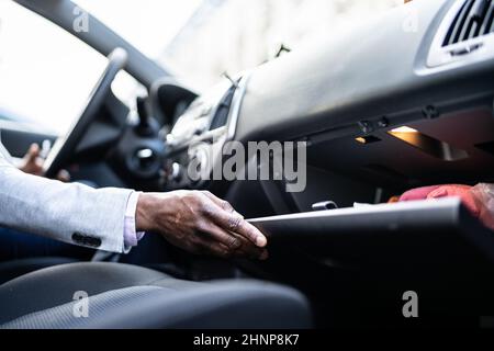 Open Car Glove Compartment Box With Documents Stock Photo