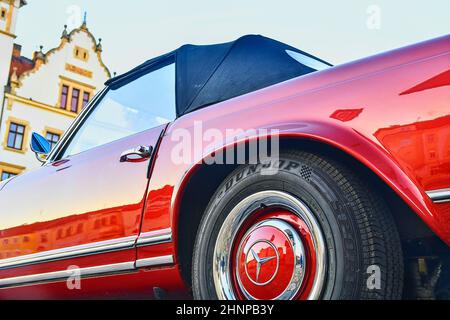 Mercedes Benz logo on vintage car wheel. Dunlop logo on tyre. Mercedes-Benz is a German automobile manufacturer. The brand is used for luxury automobiles, buses, coaches and trucks. Stock Photo